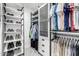 A modern closet with multiple shelves for shoes and hanging storage for clothing, ensuring organization and functionality at 5401 N 25Th St, Phoenix, AZ 85016