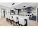 Bright kitchen features a large island with seating and is equipped with modern appliances at 5401 N 25Th St, Phoenix, AZ 85016