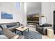 Inviting living room with comfortable seating, a stylish fireplace, and neutral tones at 5401 N 25Th St, Phoenix, AZ 85016