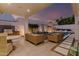Outdoor patio featuring ample seating, a barbecue, and access to a sparkling pool for luxurious relaxation and entertaining at 5401 N 25Th St, Phoenix, AZ 85016