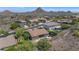Aerial view of the home featuring a pool and mountain view at 6133 W Fetlock Ter, Phoenix, AZ 85083