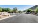 Welcoming entrance to Crescent Hills, featuring stone signage and a gated entry, offering security and curb appeal at 6133 W Fetlock Ter, Phoenix, AZ 85083