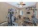 Exercise room with weights and workout equipment and plantation shutters at 6133 W Fetlock Ter, Phoenix, AZ 85083