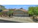 Charming home with a three-car garage and low-maintenance landscaping at 6133 W Fetlock Ter, Phoenix, AZ 85083
