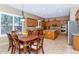 Spacious kitchen with wood cabinets, granite countertops, and stainless steel appliances at 6133 W Fetlock Ter, Phoenix, AZ 85083