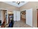 Spacious office with tile flooring and access to multiple rooms at 6133 W Fetlock Ter, Phoenix, AZ 85083