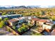 Aerial view showcasing modern homes with private backyards, desert landscaping, and mountain views at 6525 E Cave Creek Rd # 40, Cave Creek, AZ 85331
