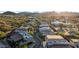 Stunning aerial view of modern homes nestled in a desert landscape with mountains in the background at 6525 E Cave Creek Rd # 40, Cave Creek, AZ 85331