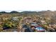 Aerial view of a street featuring attractive buildings and desert landscaping at 6525 E Cave Creek Rd # 40, Cave Creek, AZ 85331