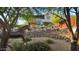 A beautifully landscaped backyard boasts unique art and a stunning view of the home at 6525 E Cave Creek Rd # 40, Cave Creek, AZ 85331