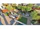 Inviting backyard shows desert landscaping, artificial turf, seating around a firepit, and a hot tub at 6525 E Cave Creek Rd # 40, Cave Creek, AZ 85331