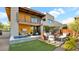 Stunning backyard features a pool, covered patio, outdoor seating, and beautiful modern home architecture at 6525 E Cave Creek Rd # 40, Cave Creek, AZ 85331