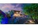 Expansive backyard with elegant lighting, manicured plants and an extended patio at 6525 E Cave Creek Rd # 40, Cave Creek, AZ 85331