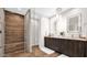 Spa-like bathroom with walk-in shower, modern fixtures, floating vanity, and stylish lighting at 6525 E Cave Creek Rd # 40, Cave Creek, AZ 85331