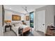 Bright bedroom featuring modern decor, ceiling fan, and a large window at 6525 E Cave Creek Rd # 40, Cave Creek, AZ 85331