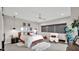 Well-lit main bedroom with contemporary style, plush bedding, and neutral color palette at 6525 E Cave Creek Rd # 40, Cave Creek, AZ 85331