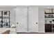 Versatile bonus room with a built-in bar area and contemporary shelving, perfect for entertaining at 6525 E Cave Creek Rd # 40, Cave Creek, AZ 85331