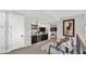 Inviting bonus room featuring a wet bar, comfortable seating, and an adjacent view into a secondary room at 6525 E Cave Creek Rd # 40, Cave Creek, AZ 85331