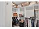 Walk-in closet with built-in storage solutions, shelving and custom racks at 6525 E Cave Creek Rd # 40, Cave Creek, AZ 85331