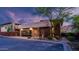 Striking exterior showcasing a modern design with desert landscaping and mountain views at 6525 E Cave Creek Rd # 40, Cave Creek, AZ 85331