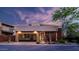 Stunning modern home featuring a glass garage door and desert landscaping at 6525 E Cave Creek Rd # 40, Cave Creek, AZ 85331
