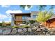 A well-manicured backyard features a patio, lush garden, and a modern home with a covered balcony at 6525 E Cave Creek Rd # 40, Cave Creek, AZ 85331