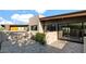 Contemporary home with a spacious stone patio and modern architecture, blending indoor-outdoor living seamlessly at 6525 E Cave Creek Rd # 40, Cave Creek, AZ 85331