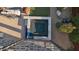 An overhead view of a modern backyard hot tub with an attached seating area and desert landscaping at 6525 E Cave Creek Rd # 40, Cave Creek, AZ 85331
