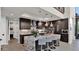 Modern kitchen features a large island with granite countertops and stainless steel appliances at 6525 E Cave Creek Rd # 40, Cave Creek, AZ 85331