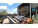 Spacious outdoor patio includes a modern fireplace, outdoor furniture, and a covered seating area at 6525 E Cave Creek Rd # 40, Cave Creek, AZ 85331
