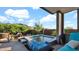 Inviting backyard pool with rock waterfall feature and mountain views creates a serene outdoor oasis at 6525 E Cave Creek Rd # 40, Cave Creek, AZ 85331