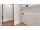 Bright laundry room with tile flooring, built-in shelving and connections at 664 E Windsor Dr, Gilbert, AZ 85296
