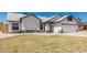 Charming single-story home featuring stucco siding, a two-car garage, and a well-maintained front yard at 676 W Shawnee Dr, Chandler, AZ 85225