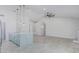 Bright living room featuring a kitchen island and tile floors throughout at 676 W Shawnee Dr, Chandler, AZ 85225