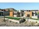 Stunning contemporary home featuring desert landscaping, geometric architecture, and mountain views at 7215 N Black Rock Trl, Paradise Valley, AZ 85253