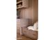Detailed view of hallway with custom drawers, bench seating, shelving, and wooden accents at 7215 N Black Rock Trl, Paradise Valley, AZ 85253