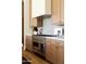 Gourmet kitchen featuring stainless steel appliances, custom wood cabinets, and marble countertops at 7215 N Black Rock Trl, Paradise Valley, AZ 85253
