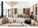 Spacious open layout featuring a modern kitchen and living area with lots of light at 7215 N Black Rock Trl, Paradise Valley, AZ 85253