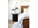 Bedroom features a nightstand with modern decor and accent sconce lighting at 7215 N Black Rock Trl, Paradise Valley, AZ 85253