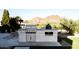 Well-equipped outdoor kitchen featuring a built-in grill, stainless steel appliances, and a countertop at 7215 N Black Rock Trl, Paradise Valley, AZ 85253