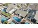 Aerial shot showcasing the backyard pool, lush landscaping, and solar panels on the roof at 7536 W Sequoia Dr, Glendale, AZ 85308