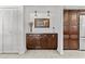 Elegant dining buffet with marble countertop, storage cabinets and modern pendant lighting at 7536 W Sequoia Dr, Glendale, AZ 85308