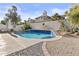 Backyard pool with lounge chairs and desert landscaping at 7536 W Sequoia Dr, Glendale, AZ 85308