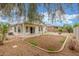 Well maintained backyard with covered patio, providing shade, and gravel landscaping at 7716 W Pueblo Ave, Phoenix, AZ 85043