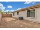 Enclosed backyard featuring neutral landscape, privacy wall, and ample space for outdoor activities at 7716 W Pueblo Ave, Phoenix, AZ 85043