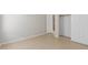Neutral toned bedroom with closet and entrance to a storage room at 7716 W Pueblo Ave, Phoenix, AZ 85043