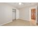 Neutral toned bedroom with ceiling fan, closet, and storage room at 7716 W Pueblo Ave, Phoenix, AZ 85043