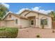 Charming single-story home with a two-car garage and desert landscaping, set in a well-maintained residential area at 7716 W Pueblo Ave, Phoenix, AZ 85043