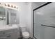 Updated bathroom showcases a sleek glass shower, modern fixtures, and neutral finishes at 7801 N 44Th Dr # 1003, Glendale, AZ 85301