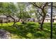 Well-manicured community grounds offer park benches, shade trees and sidewalks at 7801 N 44Th Dr # 1003, Glendale, AZ 85301